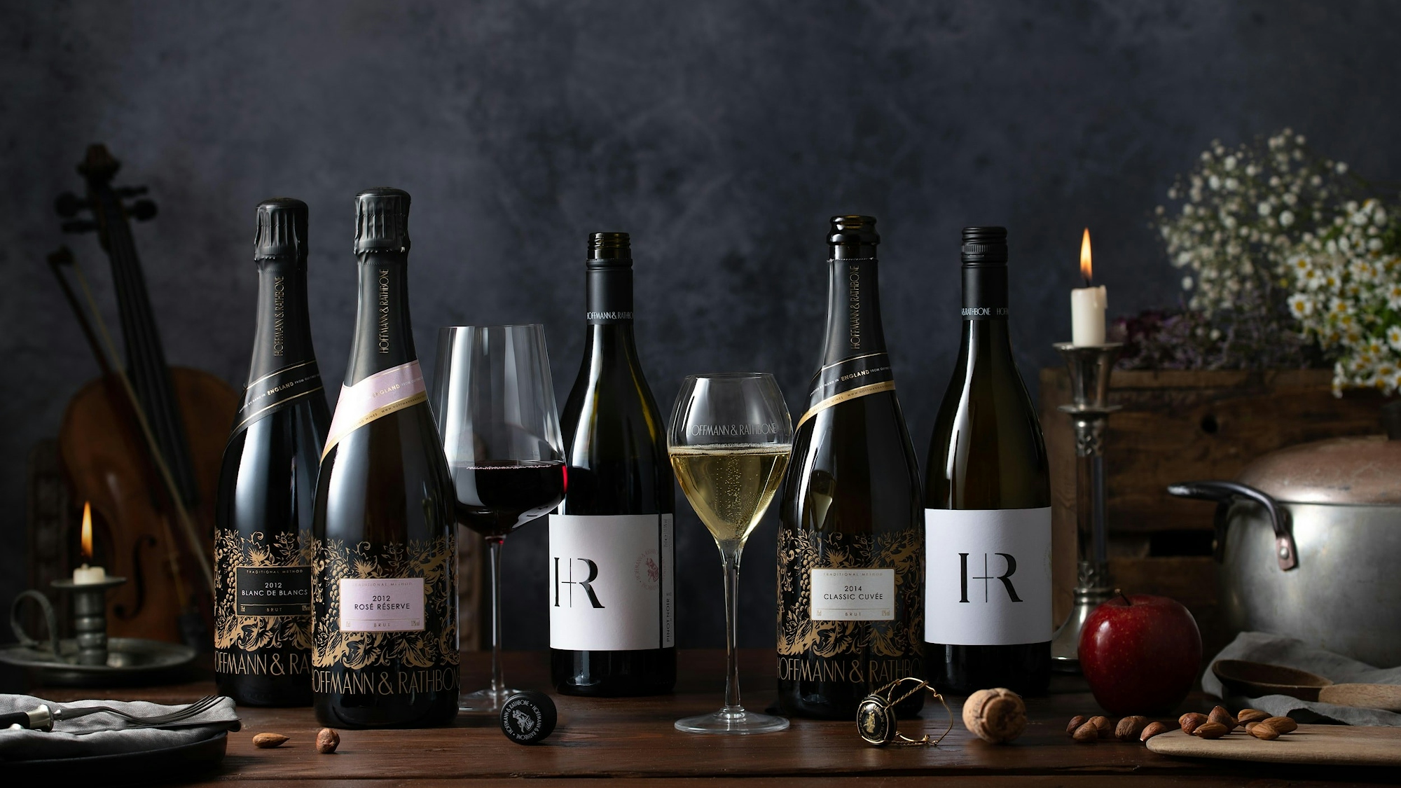 Range of Hoffmann & Rathbone wines photographed on a rustic table.